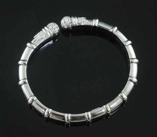 An Italian 18ct white gold and diamond set open bangle,